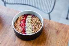Berry smoothie bowl on wooden table